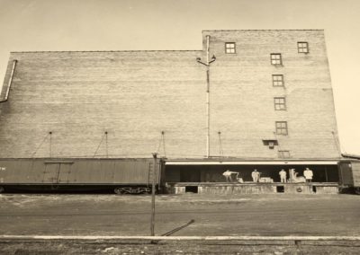 Fion MacCrea R Reynolds Vic Cornelius in hat and long coat 400x284 - Town Gallery